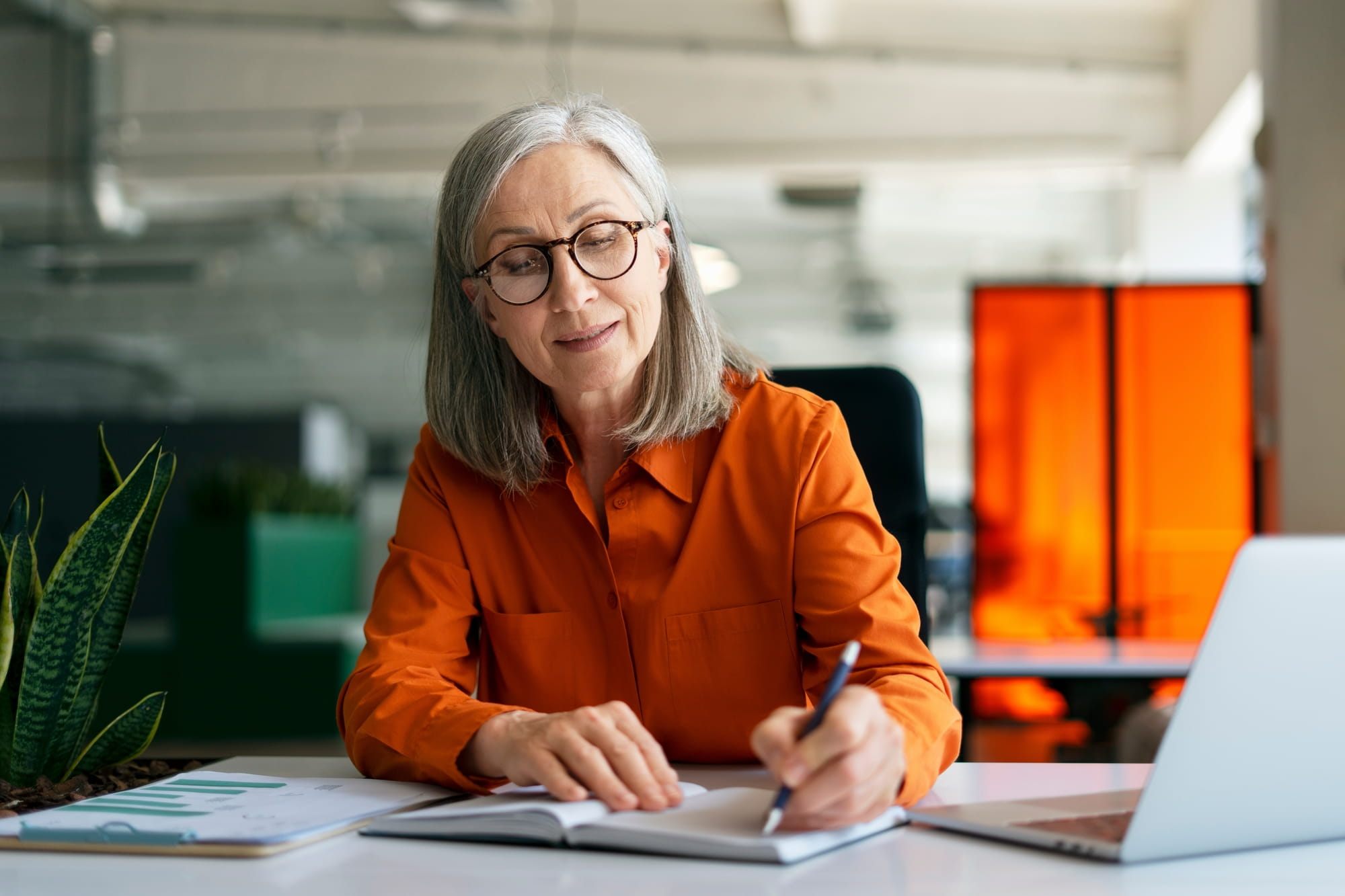 Smartly dressed colleague working in office